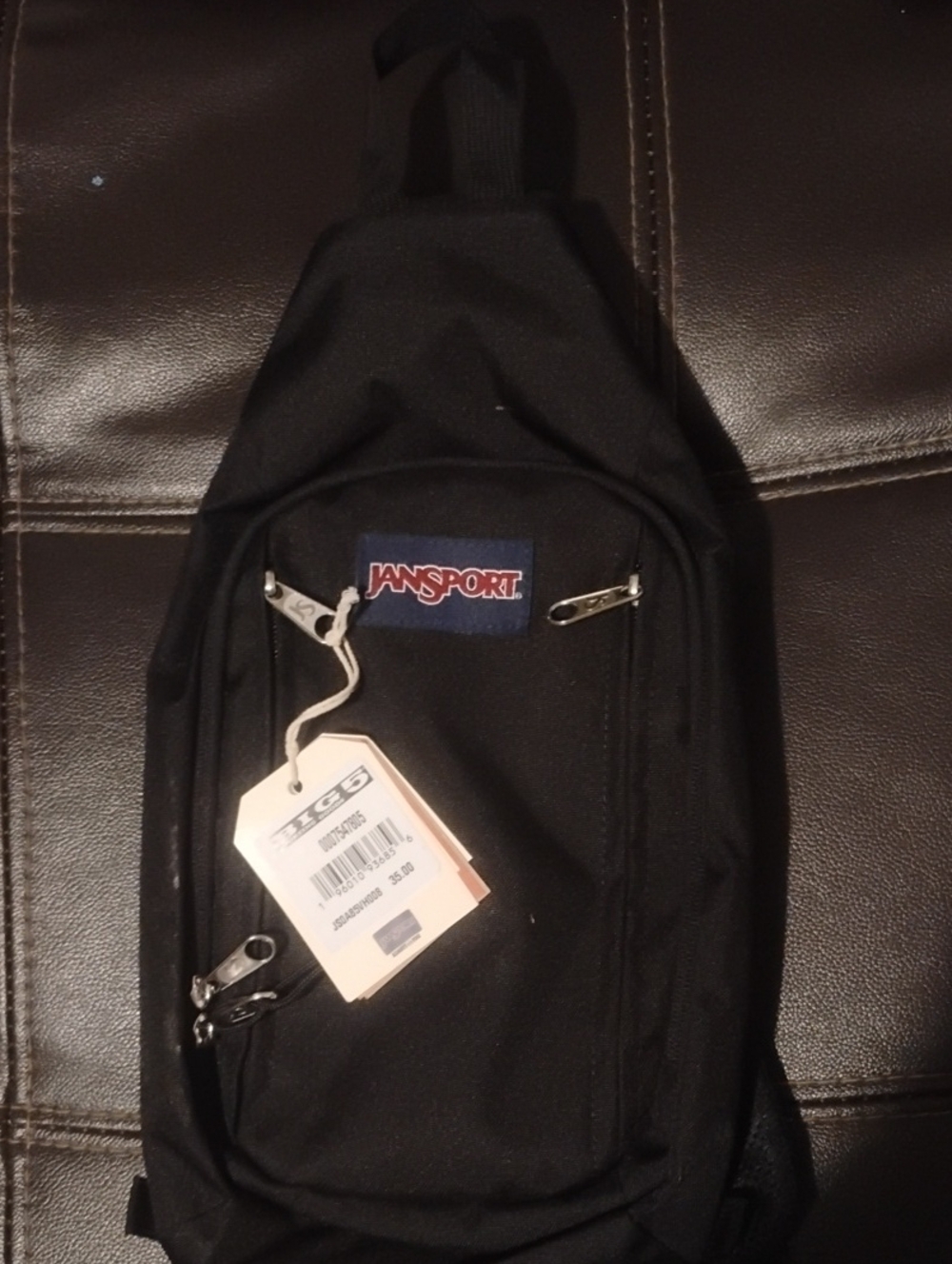Jansport Black Sling Bag with Red Logo
